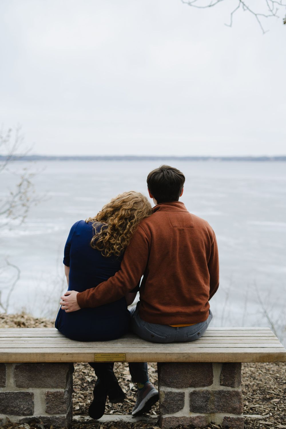 emily resting her head on jake's shoulders - couple photography in madison wisconsin
