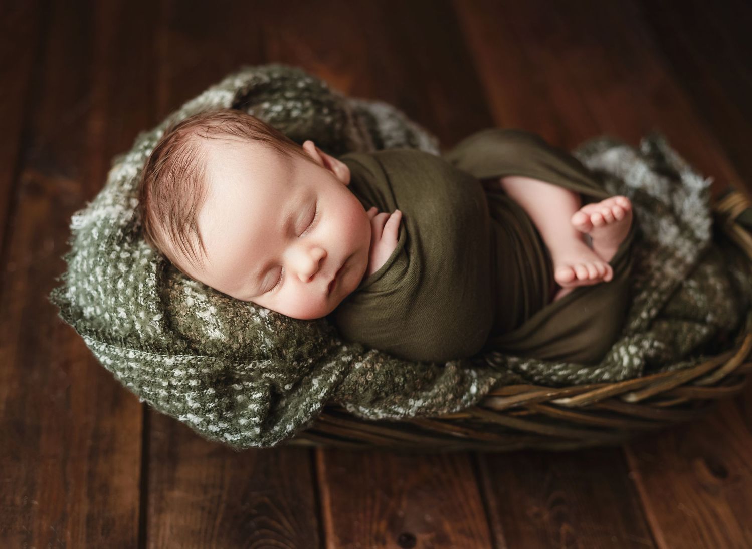 Newborn boy in green. Greenville sc newborn photographer, Easley sc newborn photographer, Upstate newborn photographer.