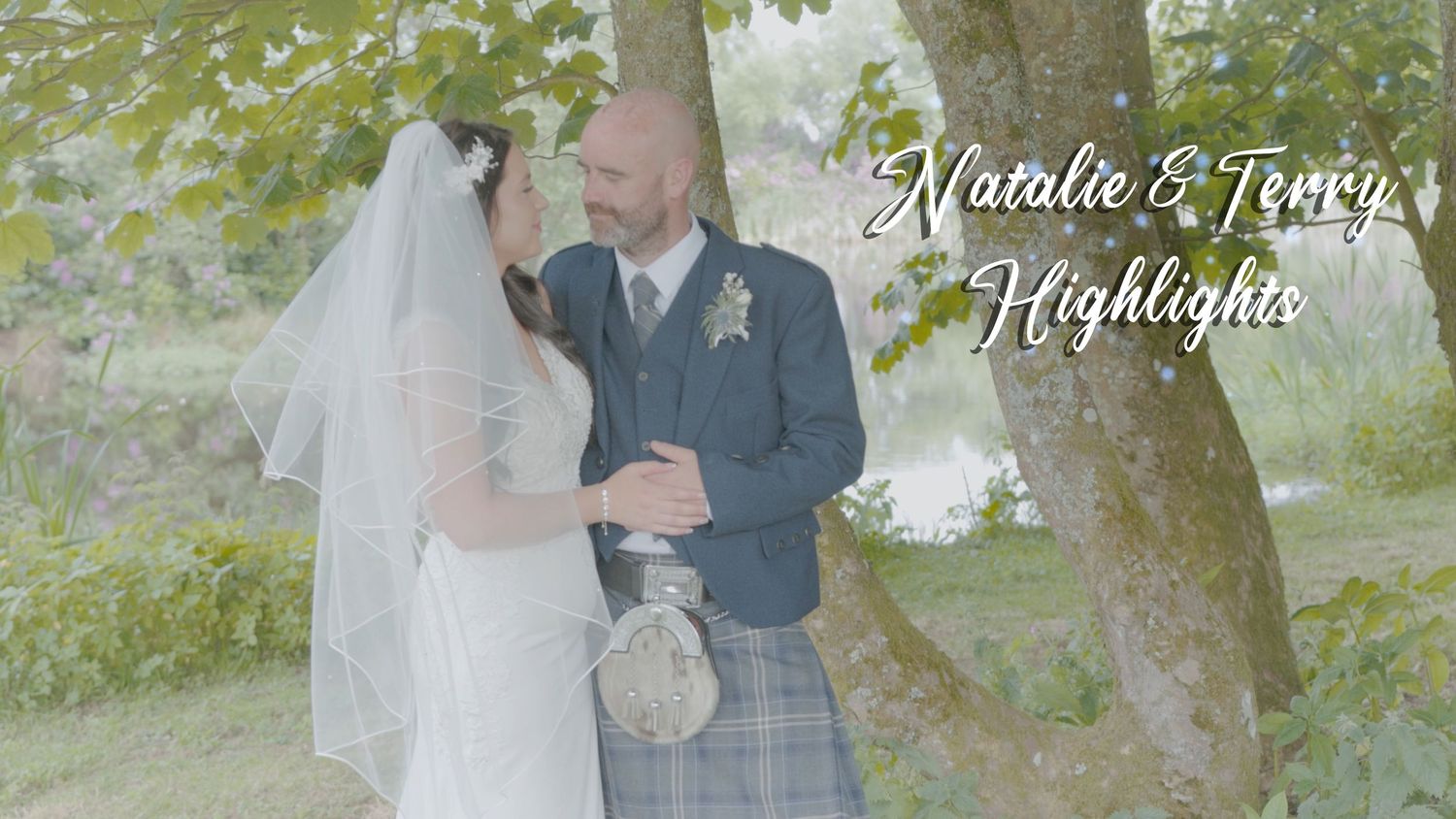 Bride and Groom under tree at Glenwhan Gardens Wedding
