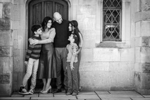 A cozy picture of a family hugging