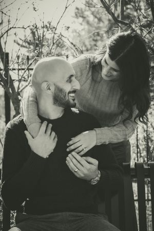 Gorgeous husband and wife sharing a moment and laughing at an inside joke