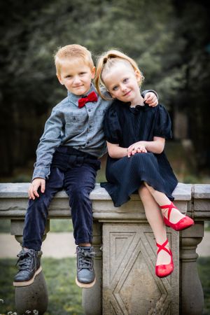 A brother is always ready to comfort his twin sister.