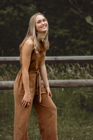 a candid and natural senior portrait catching a girl laughing