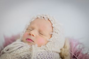 sleeping baby looks like a doll