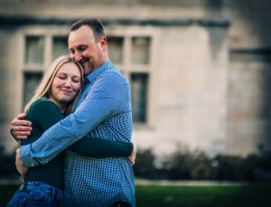 What an amazing candid moment to catch a father/daughter hug