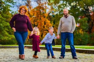This family is looking chic! Fall colors pop and compliment their wardrobe. Natural poses, candid laughs