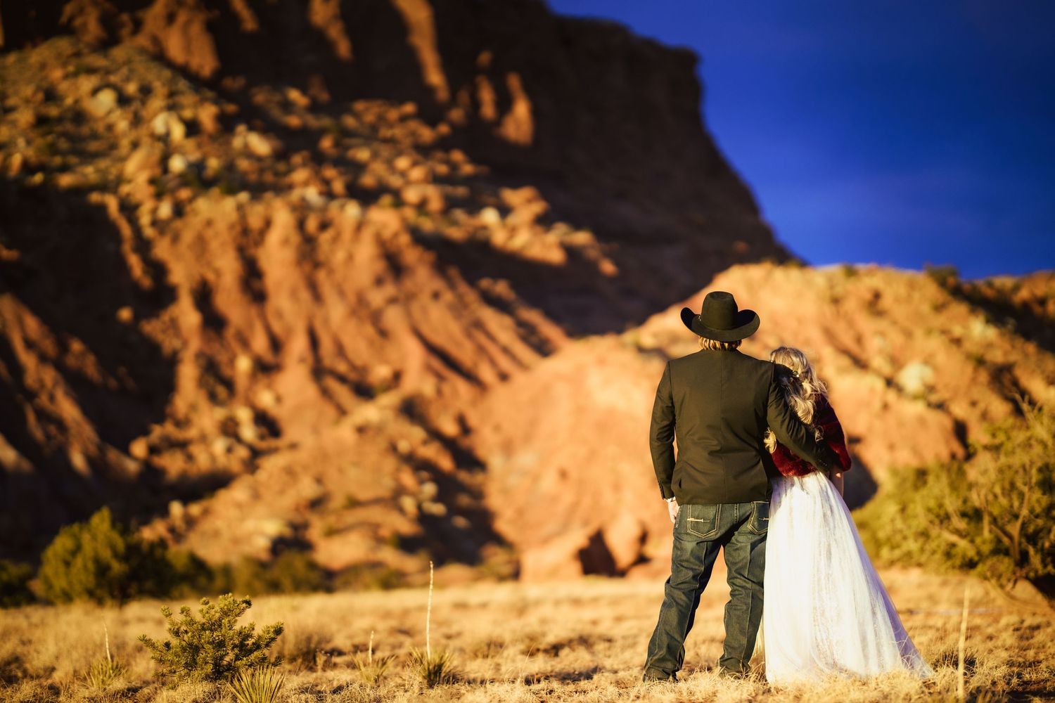 Adventure elopement posing out in desert
