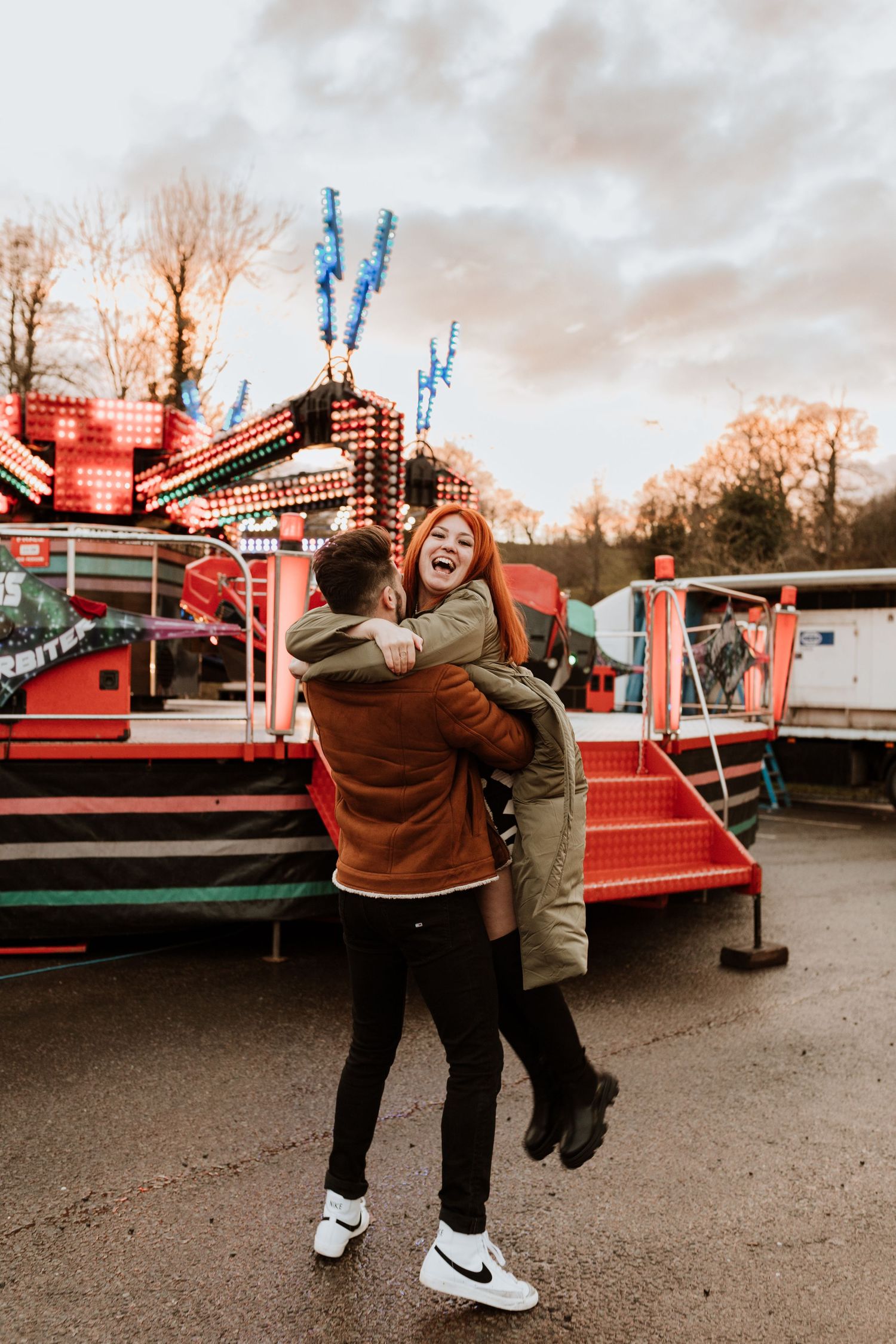 Alternative cool couples photoshoot at fun fair in wales