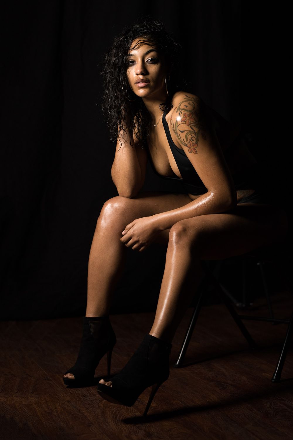 Sexy boudoir photography session in Buffalo, NY. Wet female portrait session.