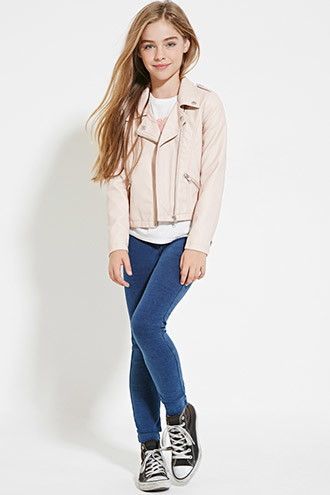 Youth fashion look featuring pink moto jacket, white top, blue jeans and black sneakers.