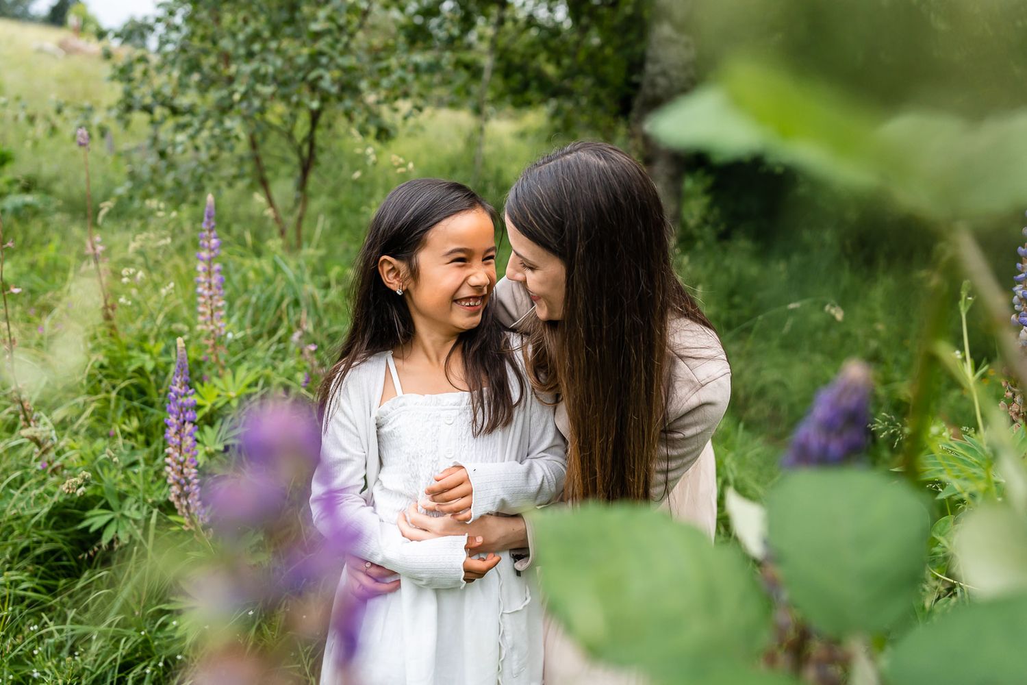 Mother daughter photographed in the lupines in Kirkland
