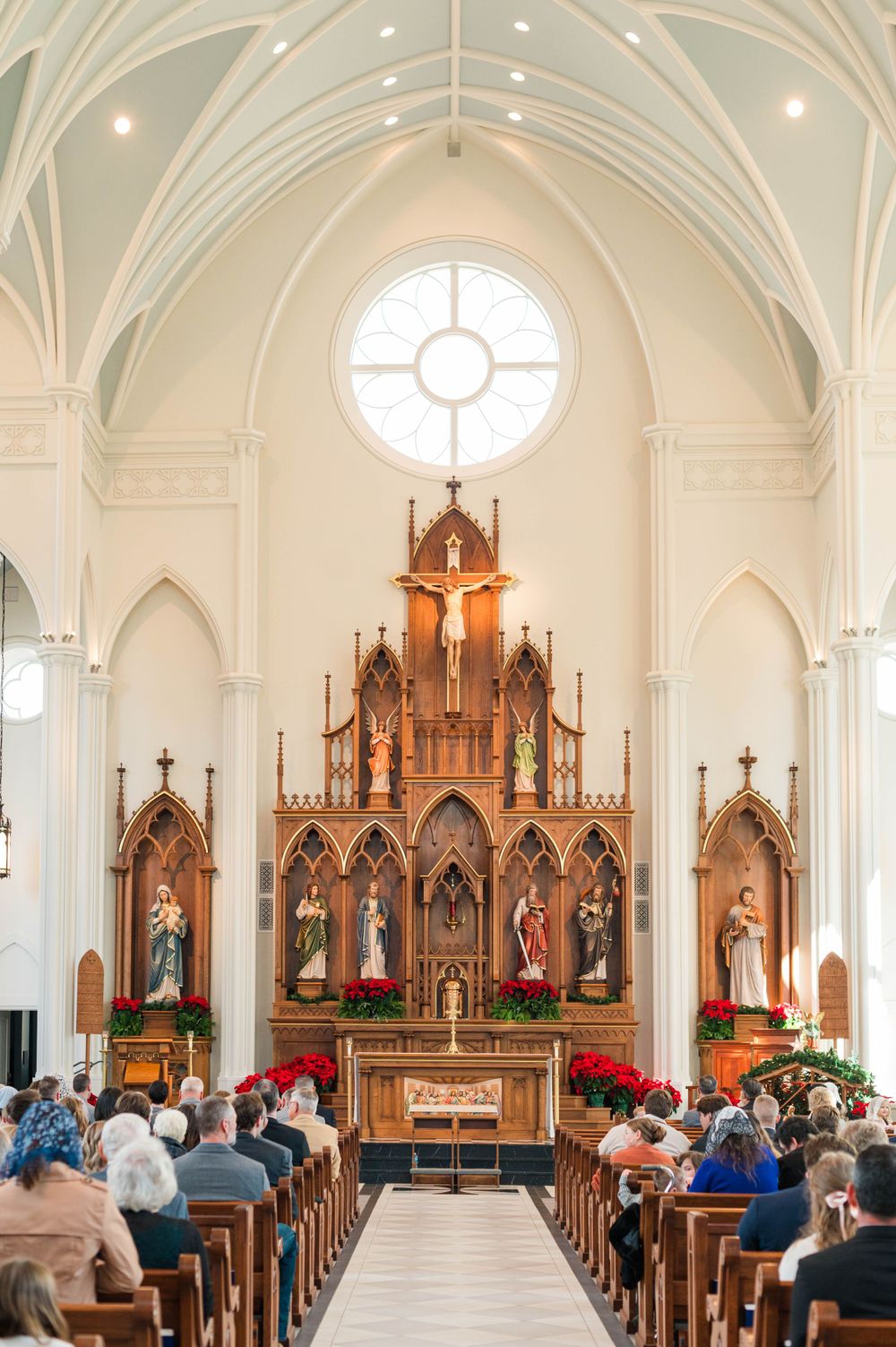 Husband and wife during their wedding mass at St. Francis Xavier in Stillwater, Oklahoma.