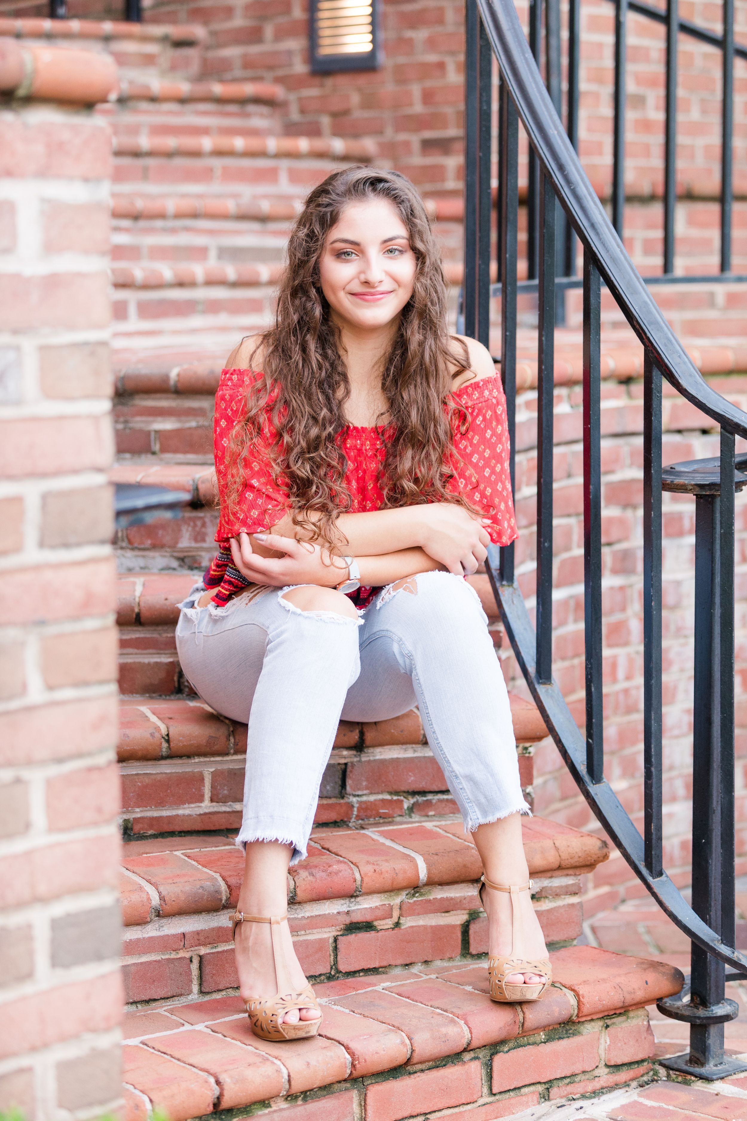 Senior girls posing on brick steps