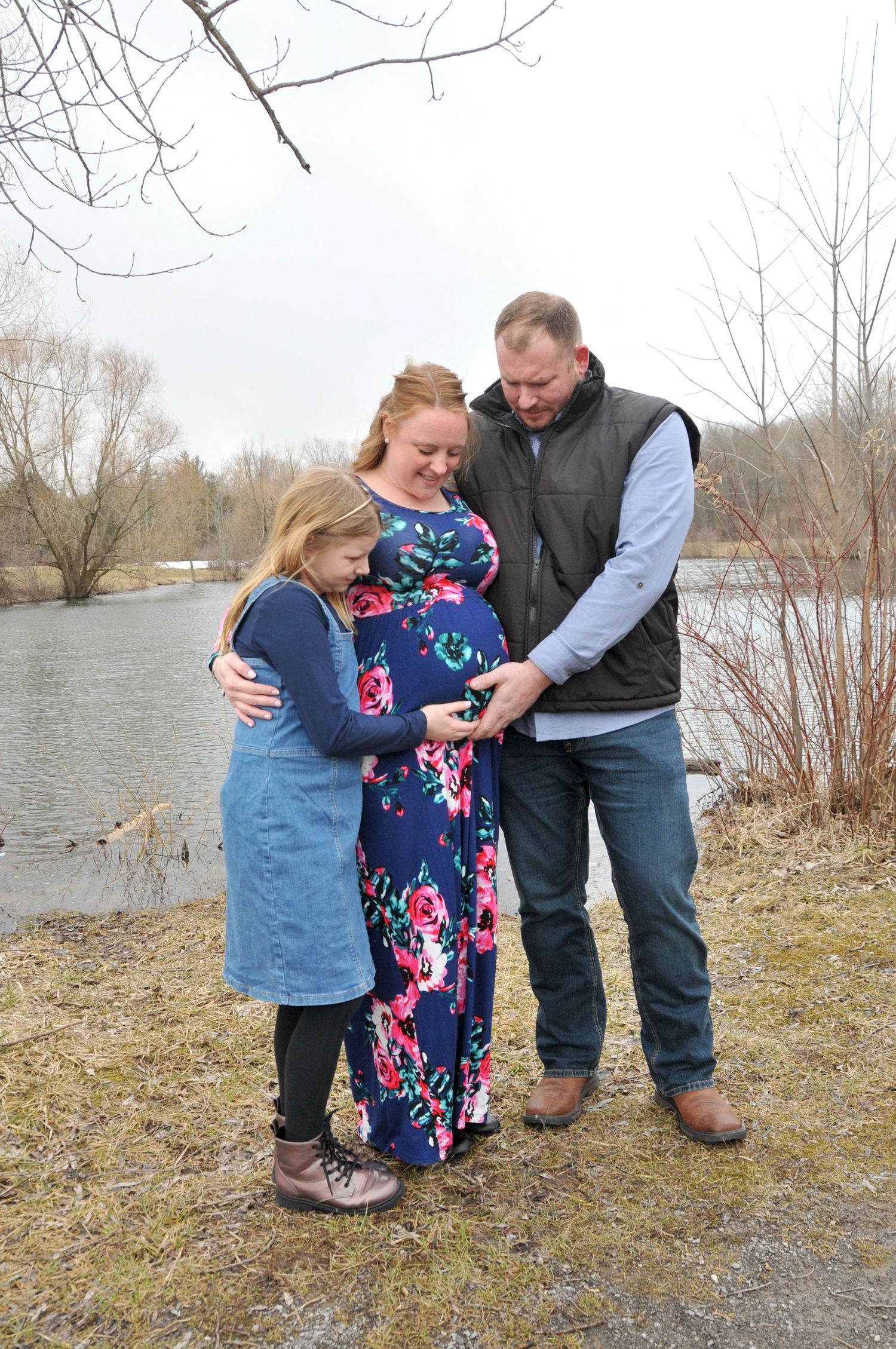 outside family maternity photo in color