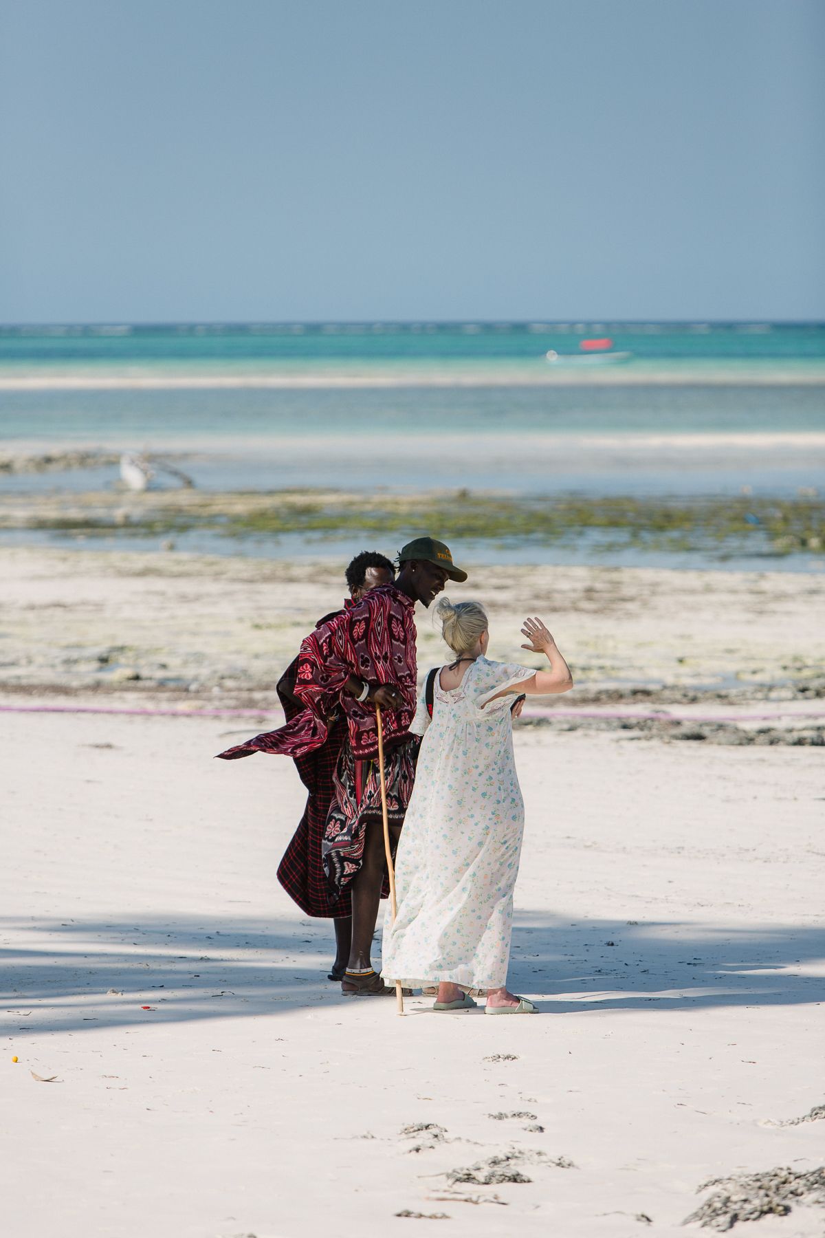 Elaine Van der Merwe-Louwrens chatting to Massai gentleman on a beach in Zanzibar.
