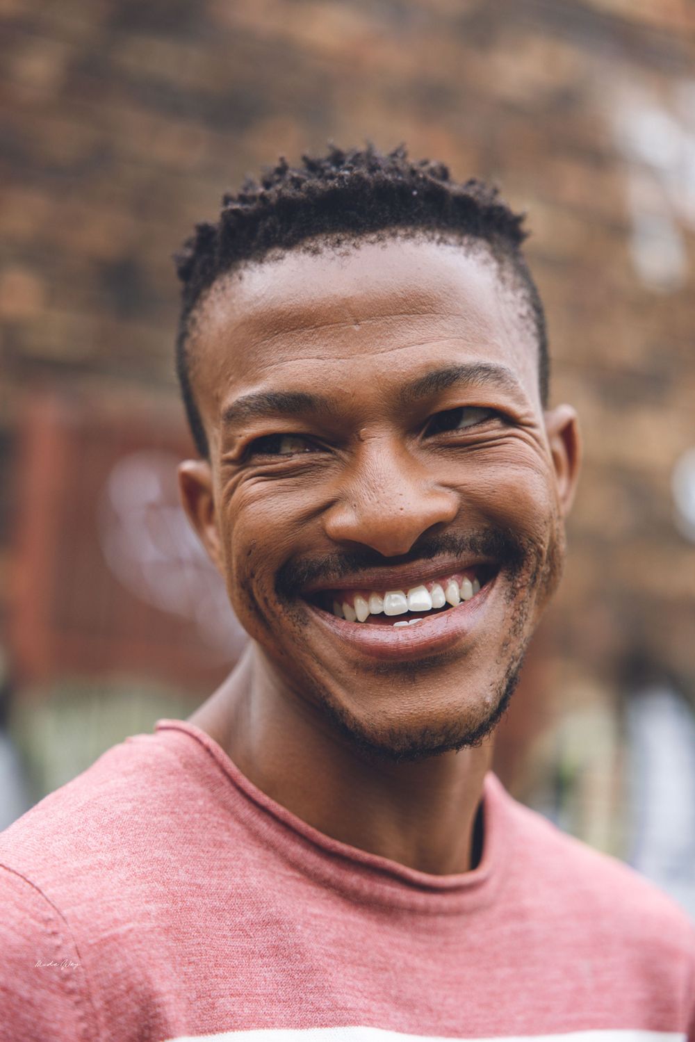 A sequence of warm portraits showing genuine laughter in pink attire.
