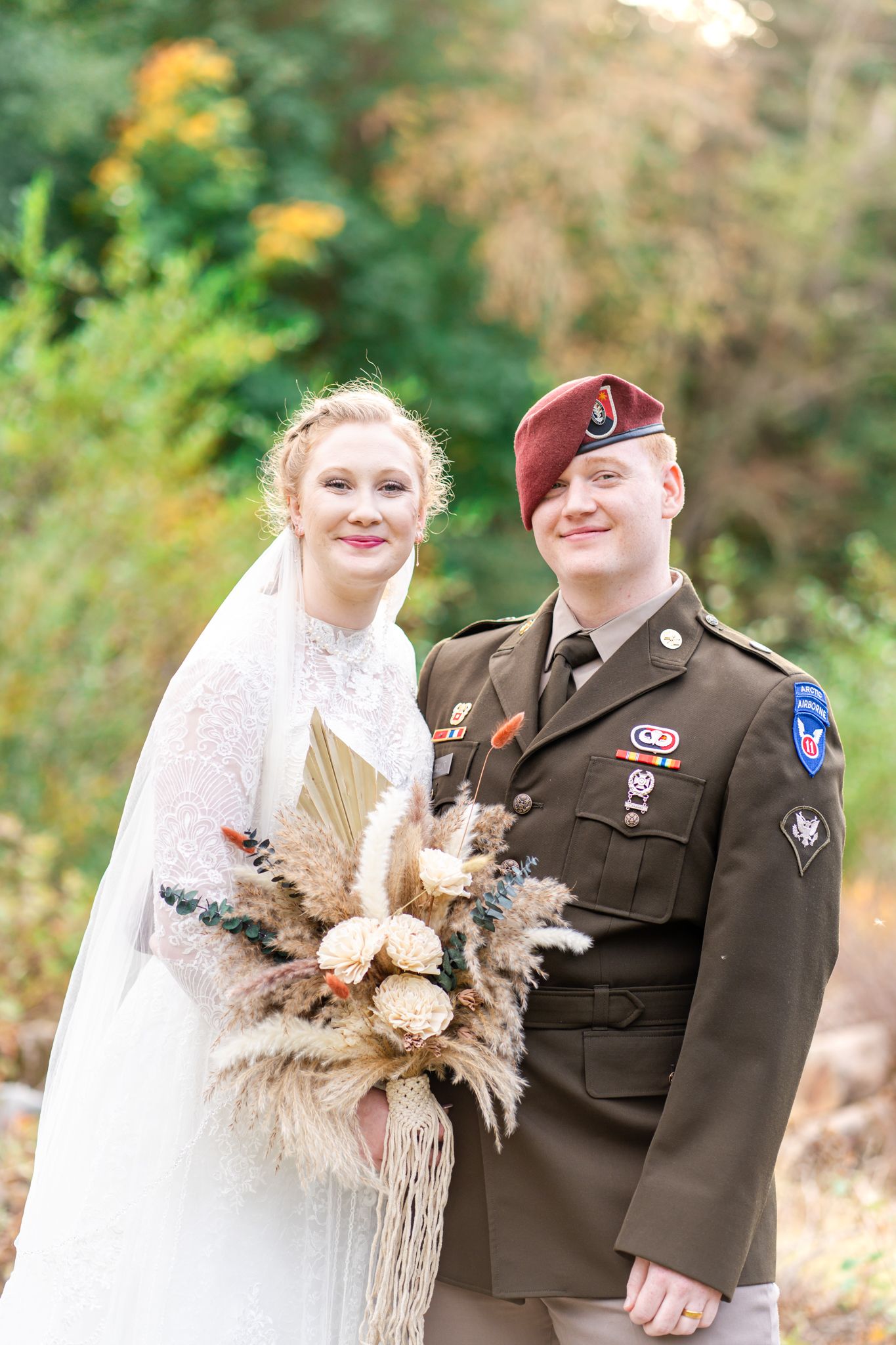 portrait of bride and groom military