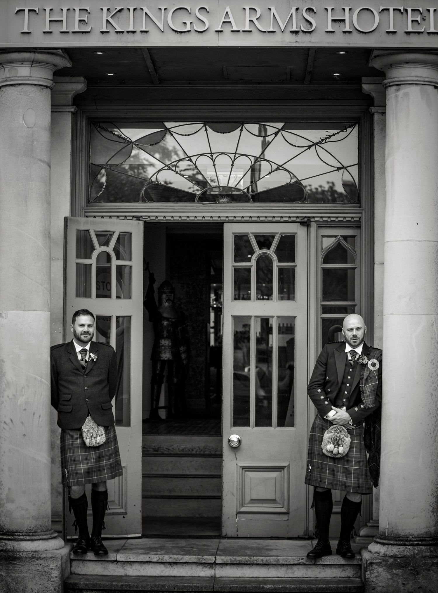 Historic Kings Arms Hotel entrance with classic architecture and columns.