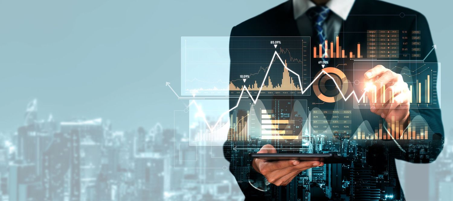 Financial data charts and graphs overlaid on cityscape background showing market analysis.