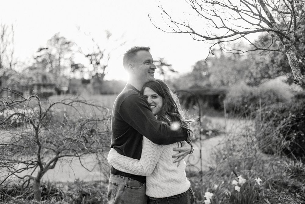 Black and white romantic portraits captured in a natural outdoor setting.
