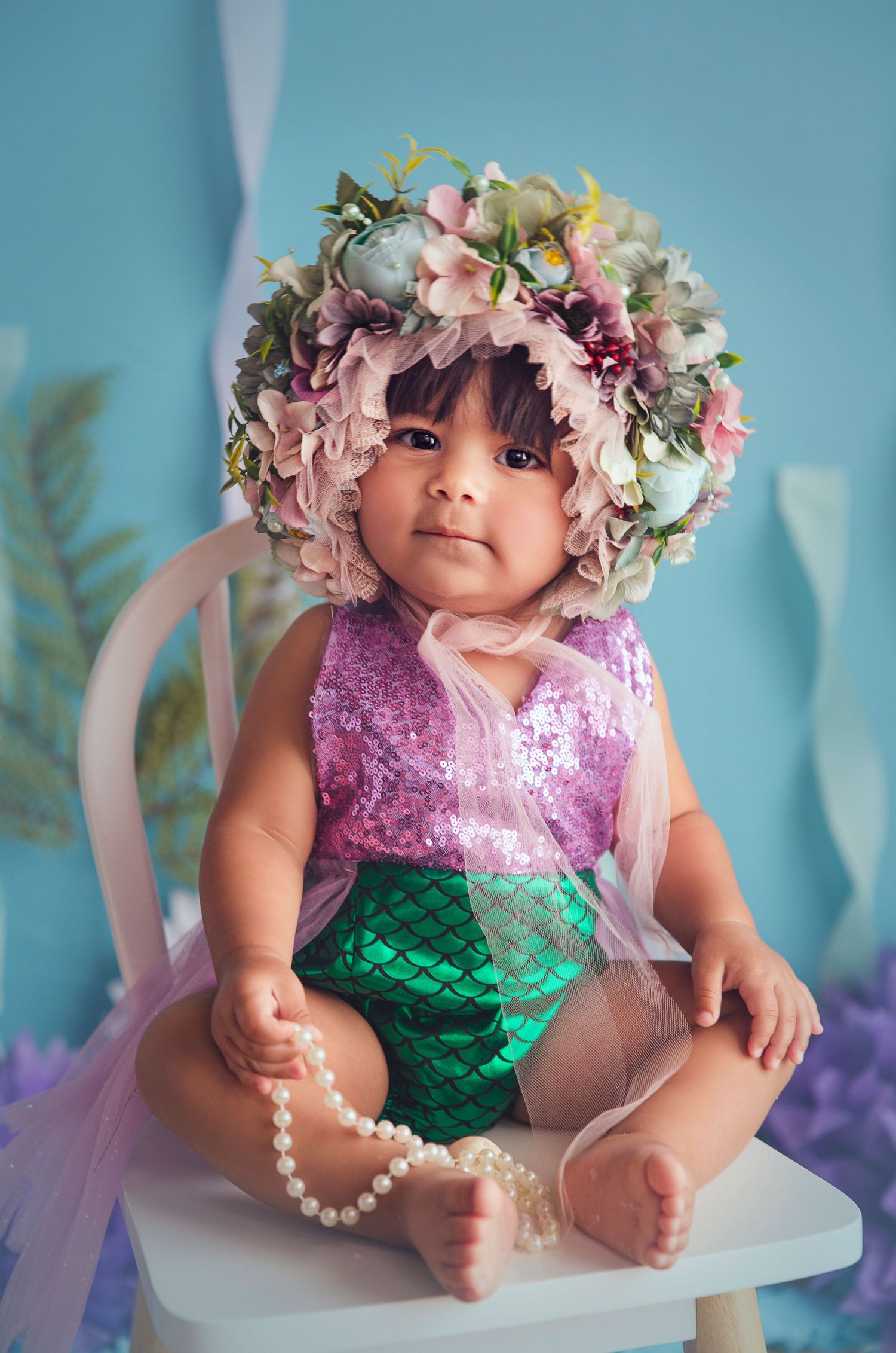 big floral bonnet on baby under the sea theme