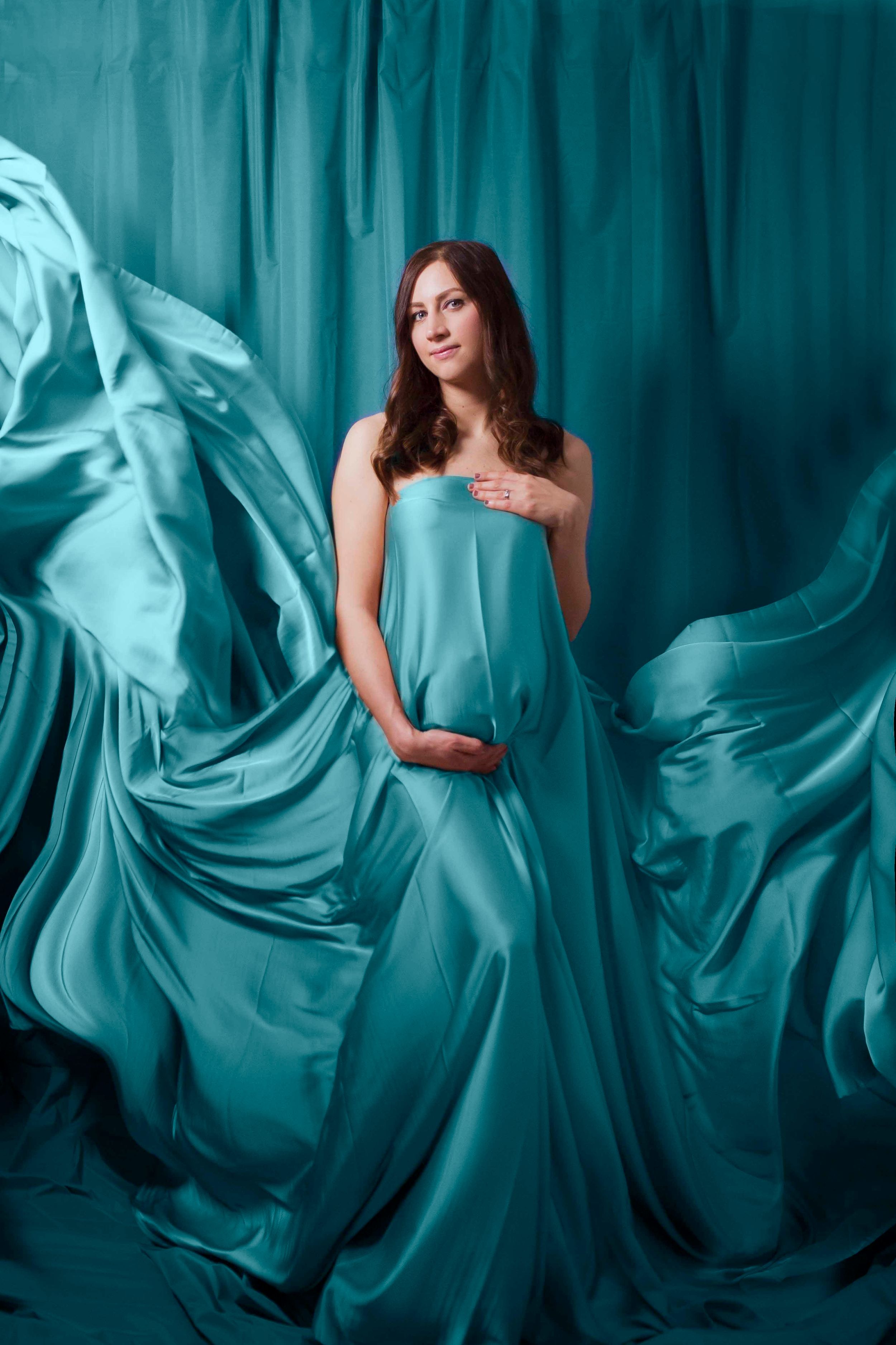 Maternity portrait with flowing fabric