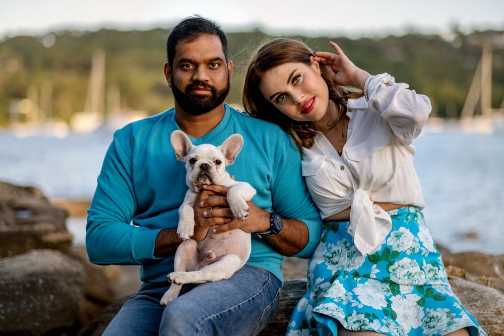 couple and their new puppy photoshoot in Mosman Balmoral Beach