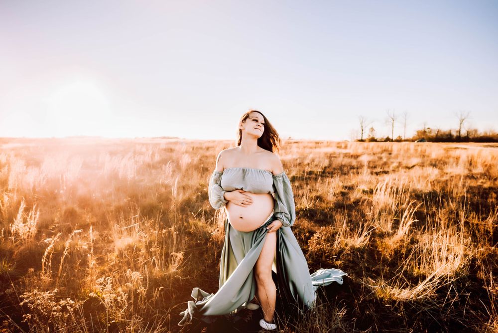 Artistic outdoor photography sequence with flowing fabric in golden light.