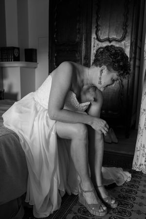 Artistic black and white sequence of romantic wedding moments in vintage interior setting.