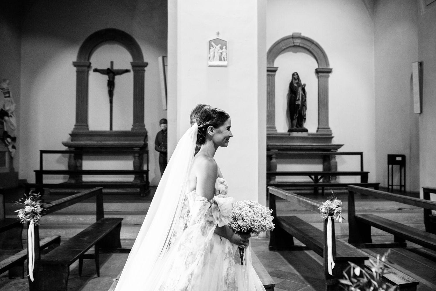 bride and father walk down the aisle