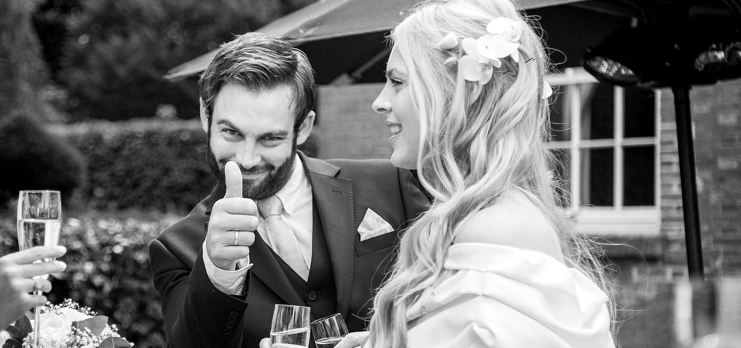 thumbs up groomsman wedding photography Leicestershire