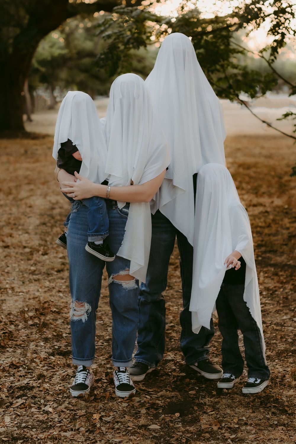 A Spooky Sheet Ghost and Pumpkin Head Halloween Family Photo Session in Seguin, Texas | Katy Montoya Photography