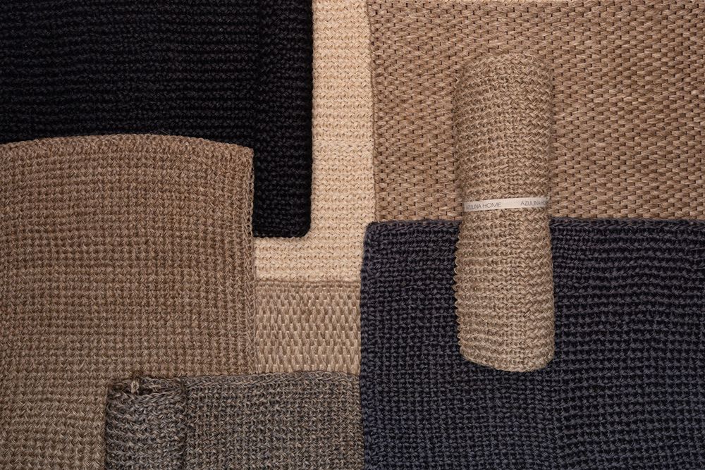 Abstract geometric pattern of knitted fabric in brown, black and beige colors.