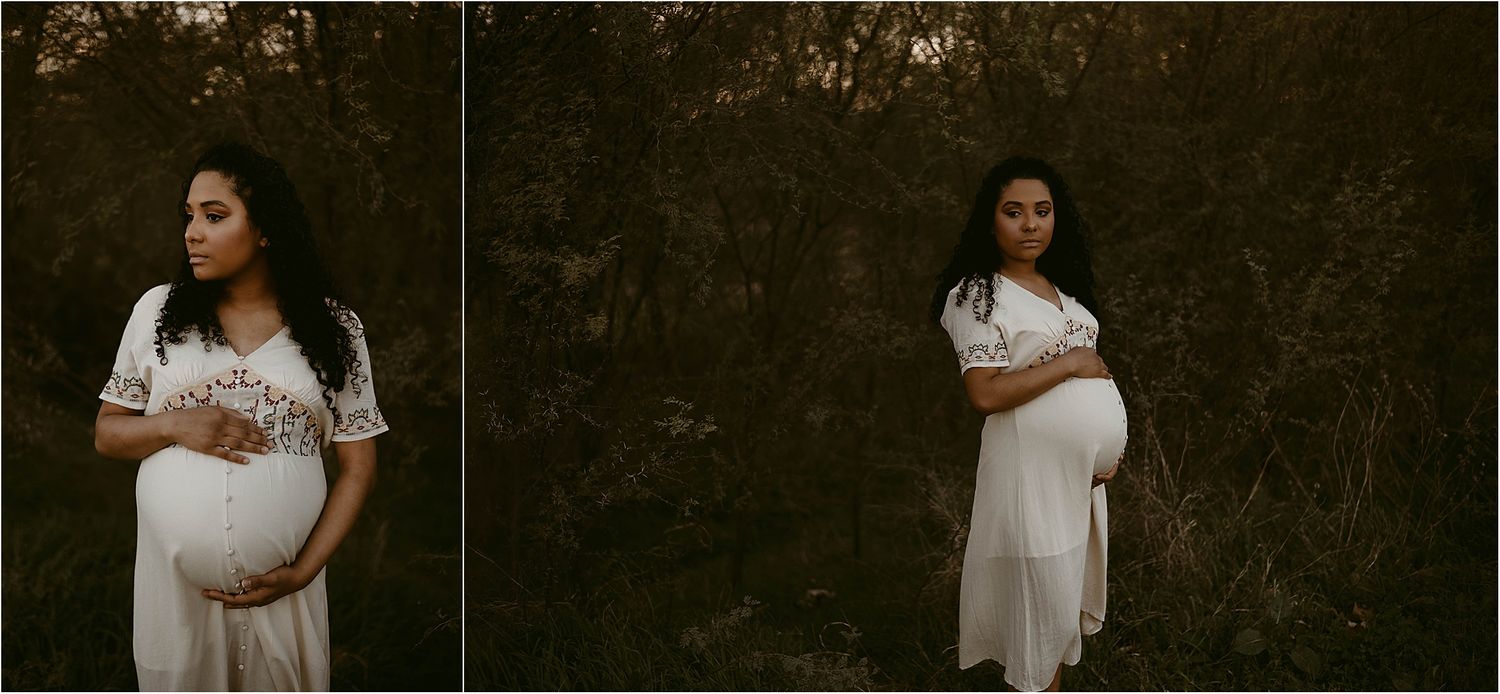Moody maternity photographs captured outdoors showing a white dress with delicate embroidery details.