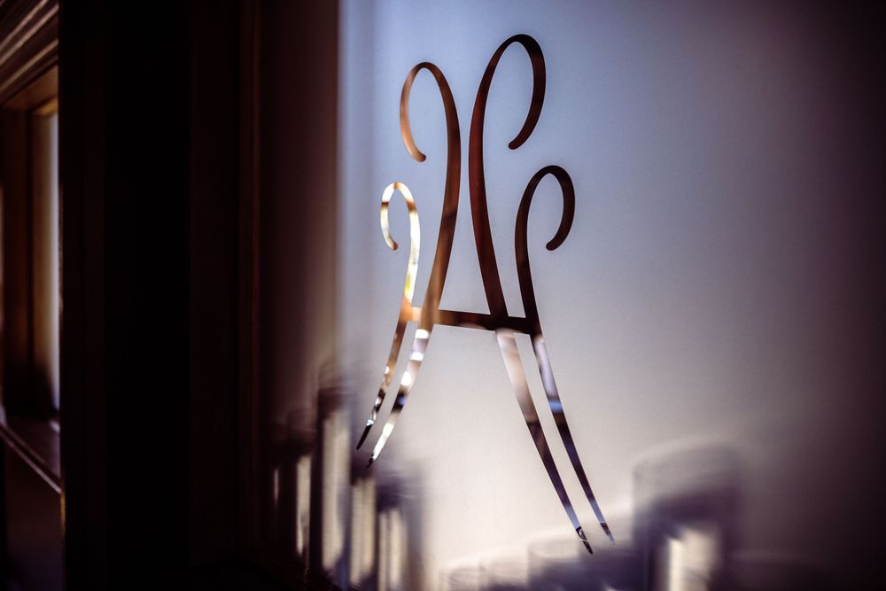 Artistic wrought iron detail photographed with shallow depth of field and soft lighting.