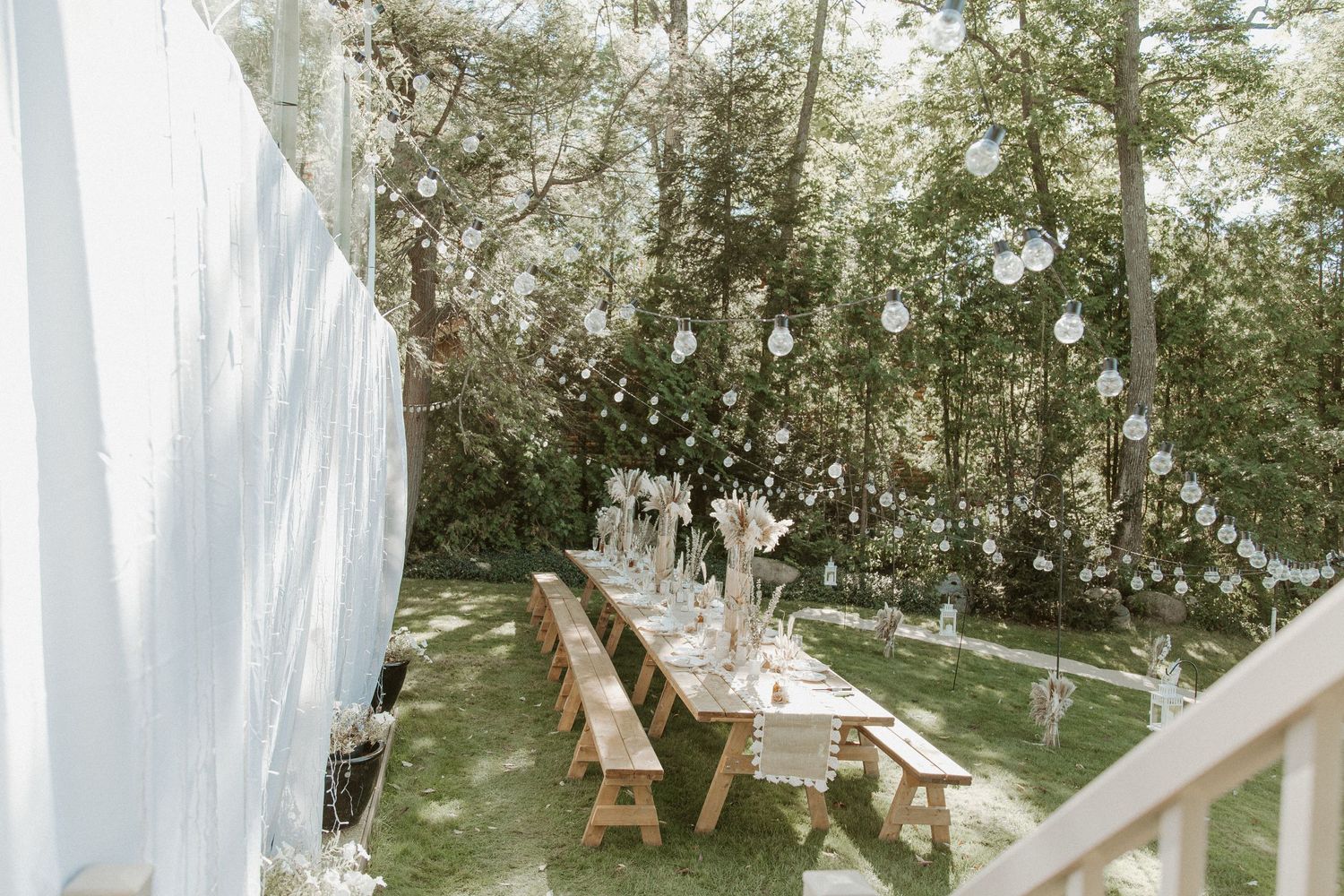 boho wedding dinner table set up with macrame and burlap, sunset