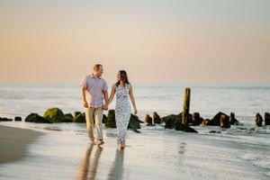 Man and woman walking on the beach