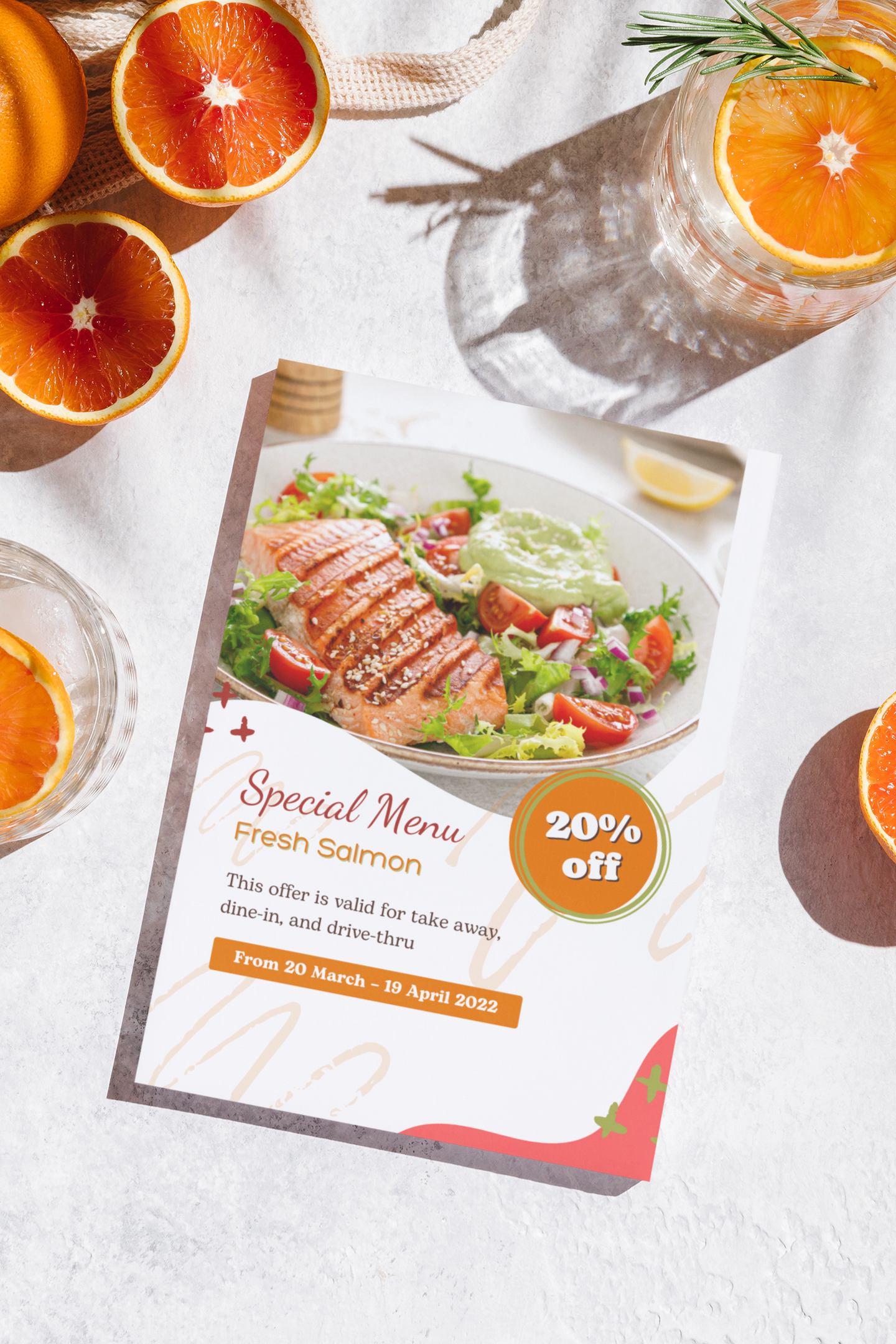 Promotional menu image of grilled salmon salad with blood oranges and special menu discount offer.