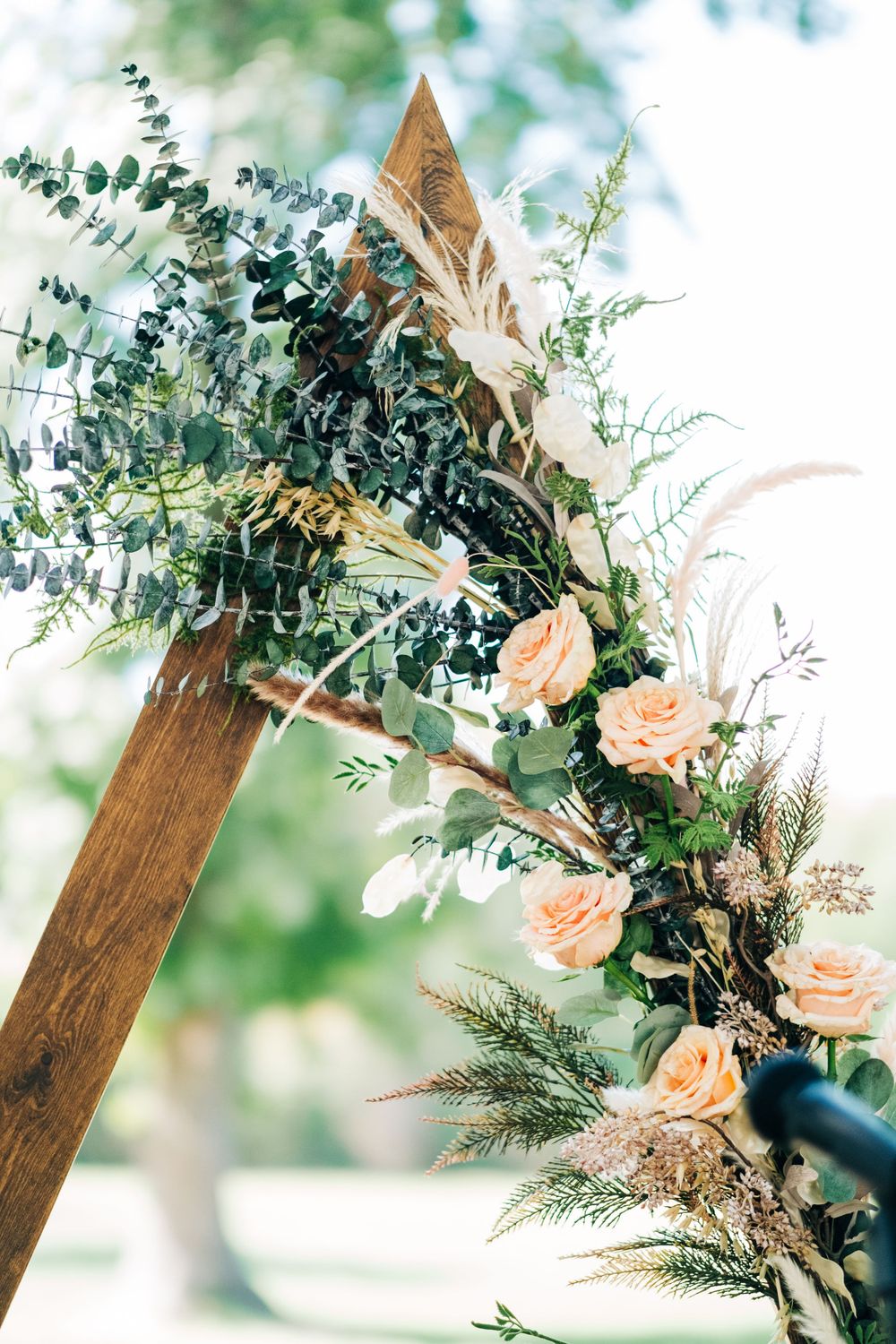 Wedding reception detail with table setting and florals