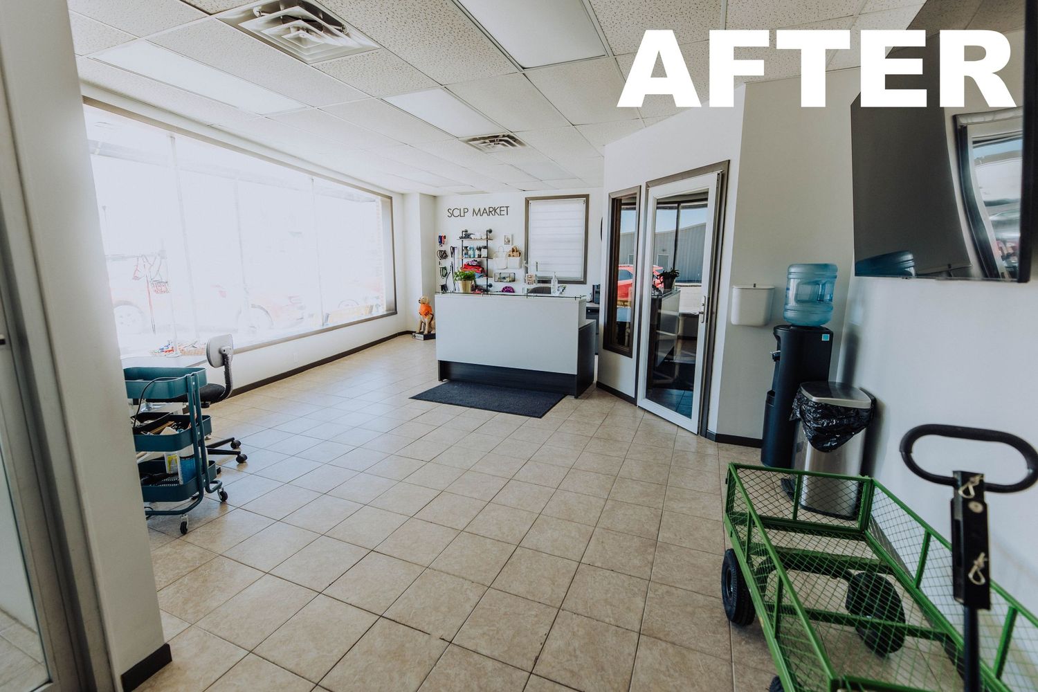 After photo revealing a renovated fitness studio space with exercise equipment and bright lighting.