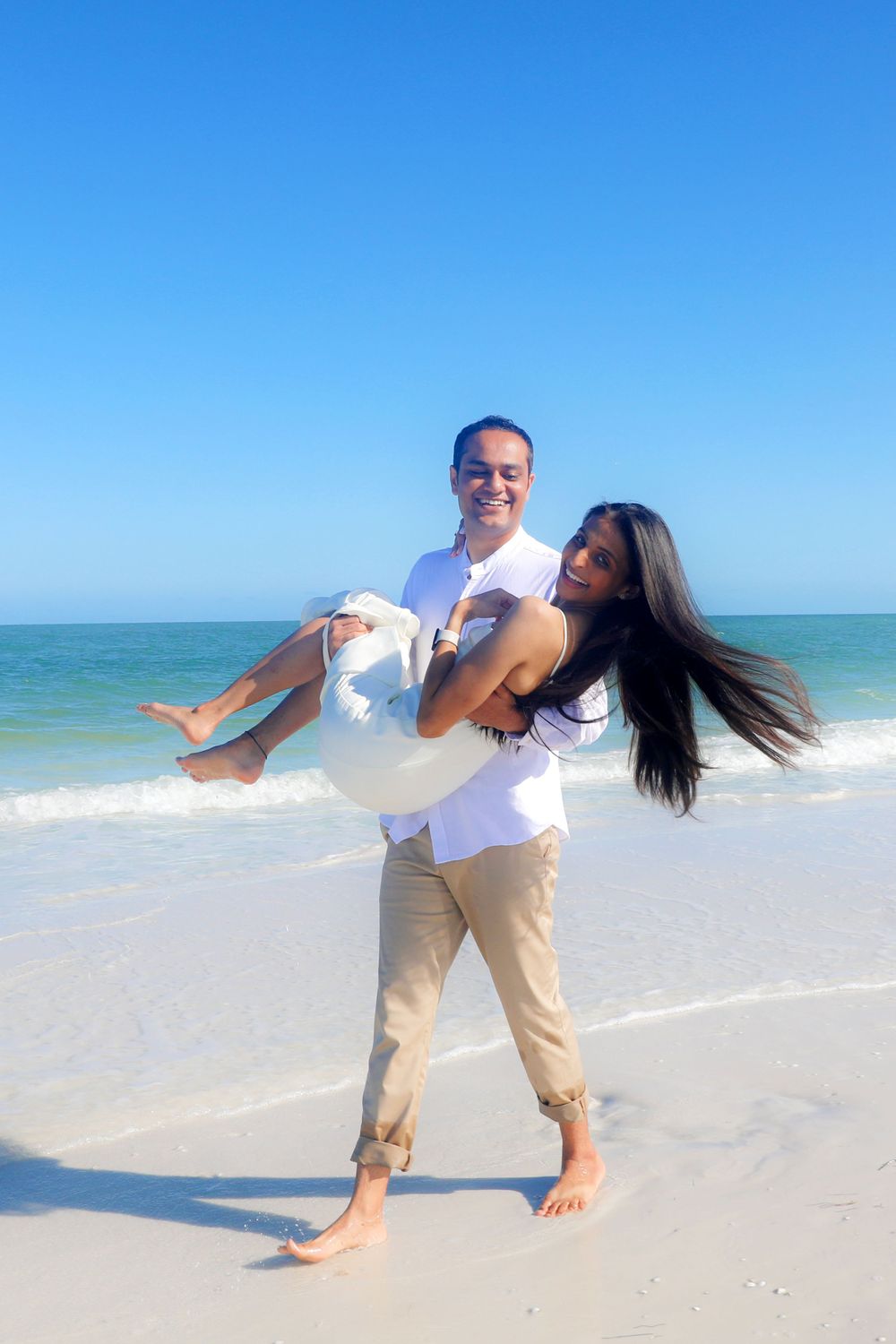 Engagement Photography – Playful Beach Engagement Session