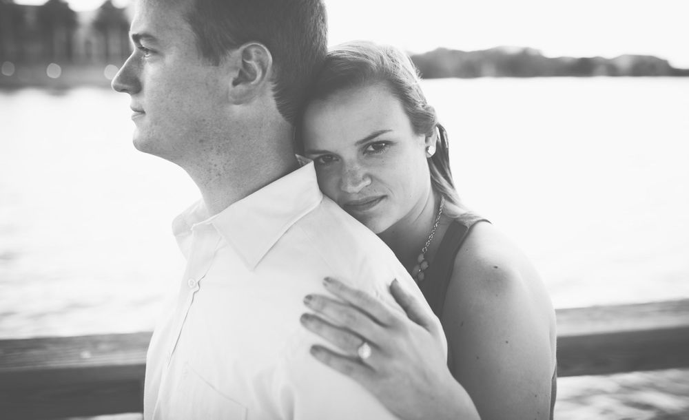 Black and white romantic couple portraits captured in soft natural lighting.