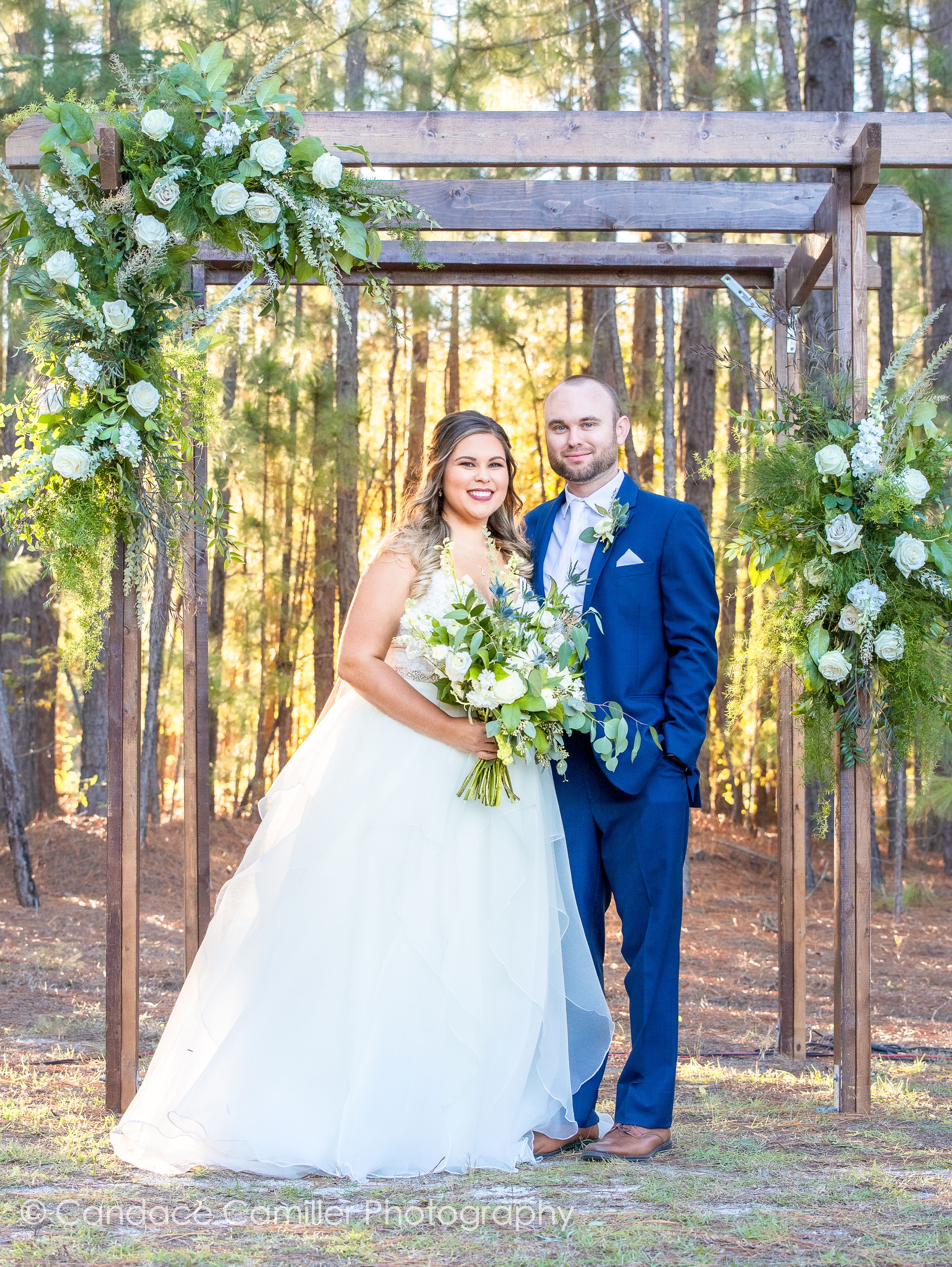 The bride and groom posing together on their wedding day, radiating love, happiness, and the promise of a lifelong journ