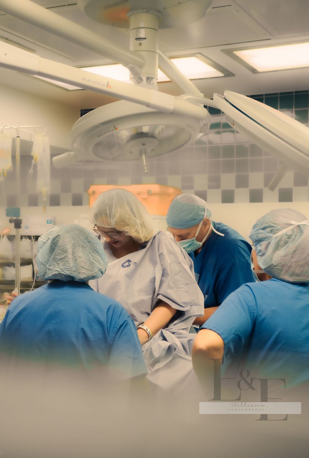 Surgical team performing an operation in a modern operating room.