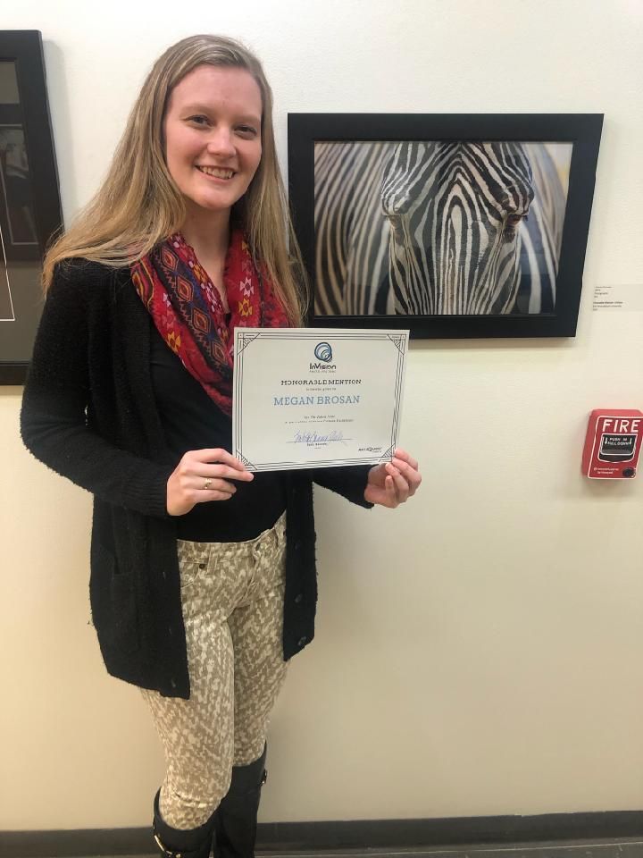 Megan Brosnan with her award winning photo "Zebra"