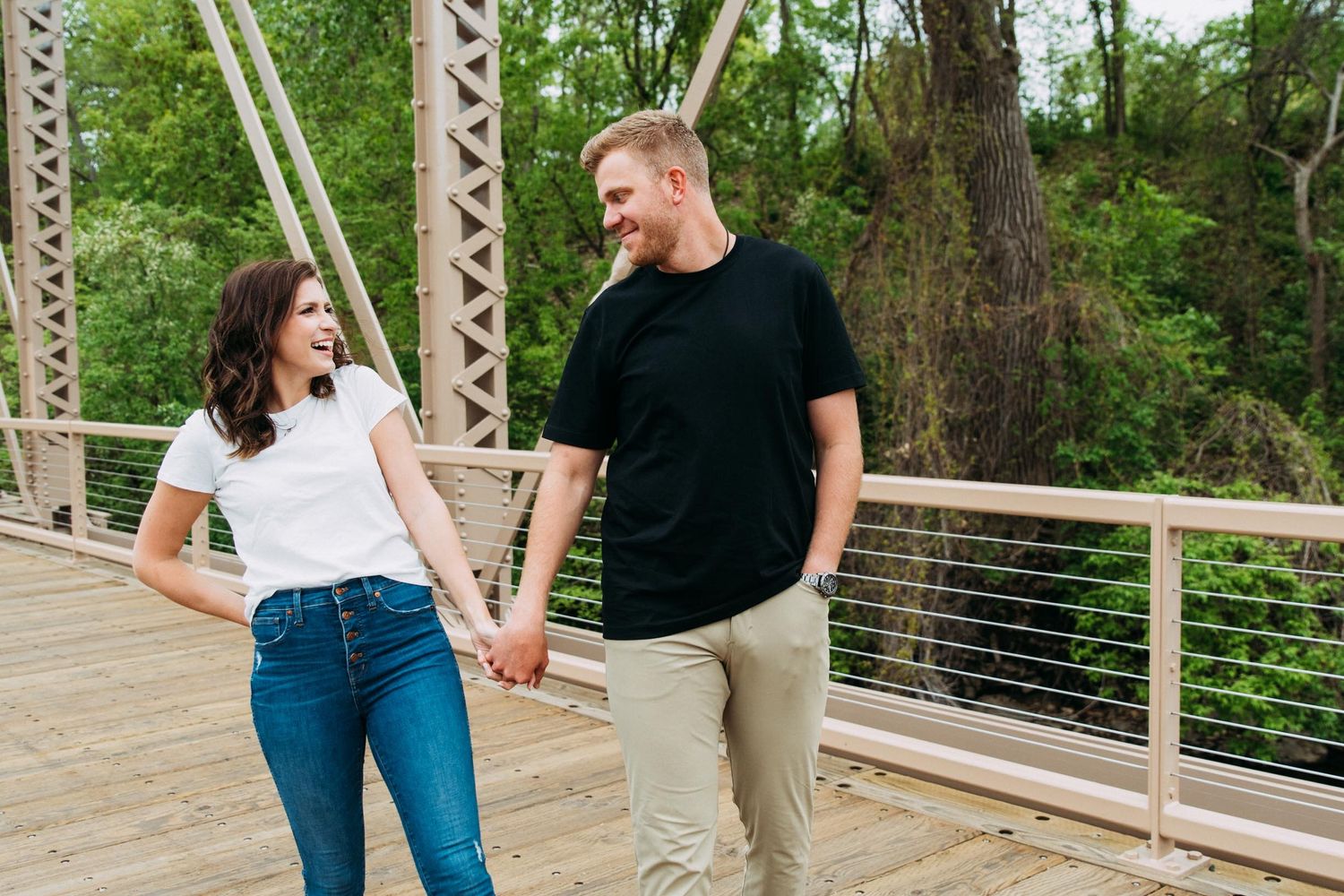 Casual white tee and blue jeans worn for engagement portraits.