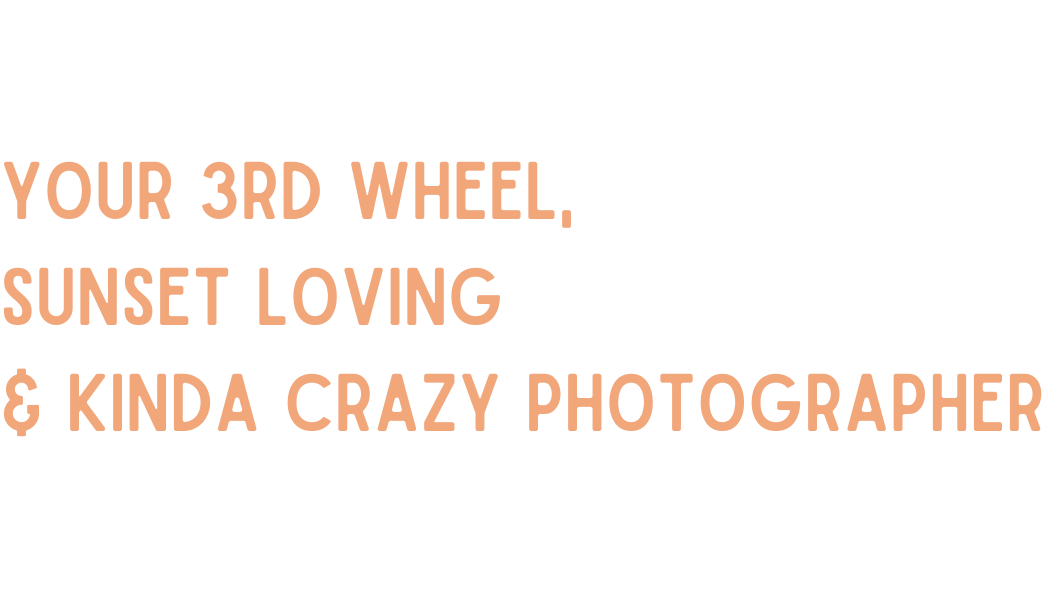 Orange neon text reading 'Your 3rd wheel, sunset loving & kinda crazy photographer' against black background.