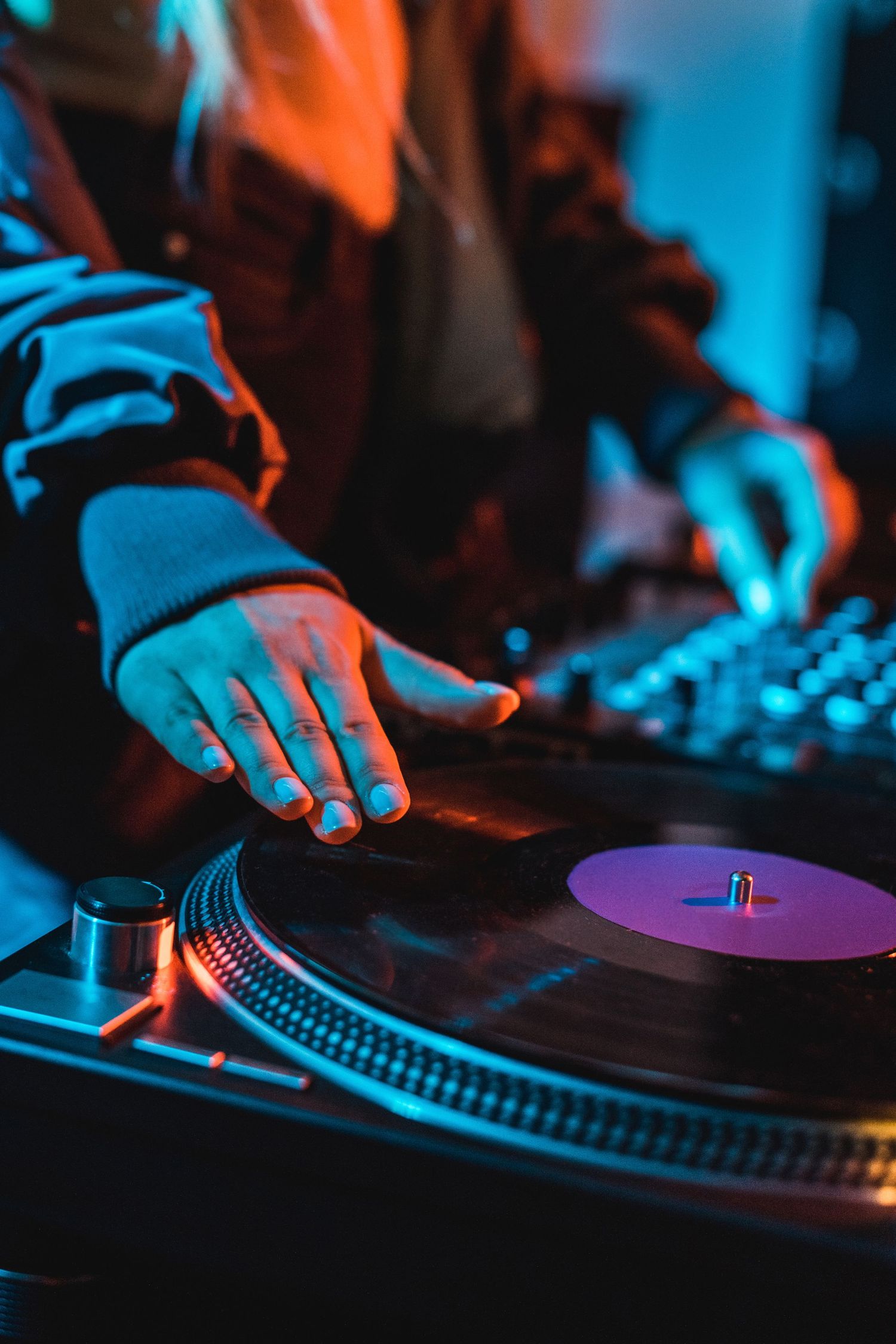 DJ mixing on turntables
