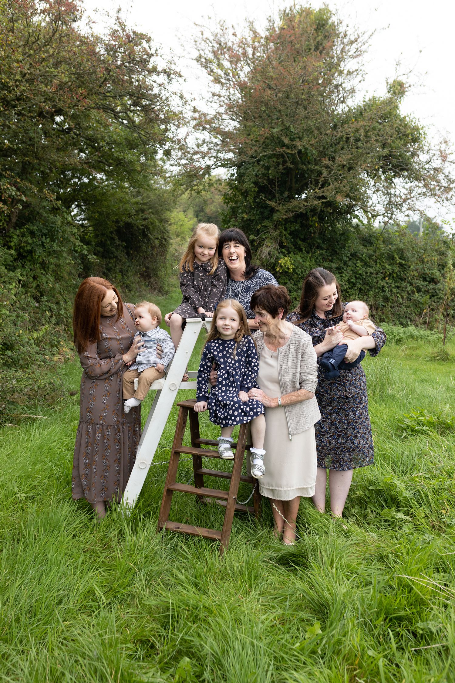 outdoor family baby photos in field  simple timeless