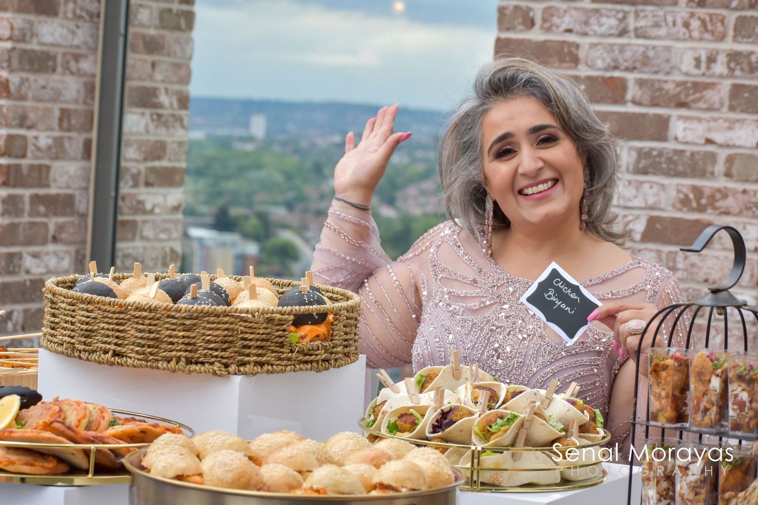 Rustic food photography setup with bread and pastries displayed on wooden surfaces.